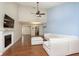Living room with hardwood floors, fireplace and sectional sofa at 5060 Hawthorne Way # 11, Avon, IN 46123