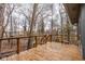 Back deck with wooden railing and view of wooded area at 5508 Bay Landing Cir, Indianapolis, IN 46254