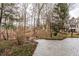 Spacious backyard with wooded area and a stone patio at 5508 Bay Landing Cir, Indianapolis, IN 46254