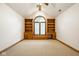 Bonus room featuring a window seat, built-in bookcases and plush carpeting at 5508 Bay Landing Cir, Indianapolis, IN 46254