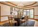 Dining room featuring an oval table, contemporary chairs, and bright natural light at 5508 Bay Landing Cir, Indianapolis, IN 46254