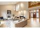 The open concept living room offers a fireplace, vaulted ceiling and hardwood floors at 5508 Bay Landing Cir, Indianapolis, IN 46254