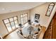 Bright living room boasts large windows, hardwood floors, and a modern fireplace feature at 5508 Bay Landing Cir, Indianapolis, IN 46254