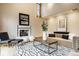 This living room boasts a fireplace, vaulted ceiling and hardwood floors at 5508 Bay Landing Cir, Indianapolis, IN 46254