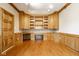Office room with custom wooden cabinetry and shelving for ample storage and organization at 5508 Bay Landing Cir, Indianapolis, IN 46254