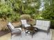 Outdoor seating arrangement on a backyard patio provides a cozy area to relax and entertain at 8207 Shorewalk Dr, Indianapolis, IN 46236