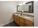 Main bathroom with double vanity and granite countertops at 8207 Shorewalk Dr, Indianapolis, IN 46236