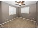 Simple bedroom with neutral walls and carpet at 8207 Shorewalk Dr, Indianapolis, IN 46236