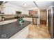 Modern kitchen with stainless steel appliances, granite countertops, and white cabinets at 8207 Shorewalk Dr, Indianapolis, IN 46236