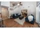 Open living room with high ceilings, hardwood floors, and view of dining area at 8207 Shorewalk Dr, Indianapolis, IN 46236