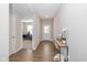 Bright entryway with hardwood floors and access to an office at 8576 Jeff Cir, Brownsburg, IN 46112