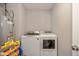 Bright laundry room with washer and dryer at 8576 Jeff Cir, Brownsburg, IN 46112