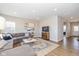 Spacious living room featuring a sectional sofa and large windows at 8576 Jeff Cir, Brownsburg, IN 46112