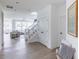 Bright entryway with hardwood floors, leading to a living area at 1175 Bevy Blvd, Danville, IN 46122