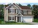 Two-story house with brown roof and attached garage at 1175 Bevy Blvd, Danville, IN 46122