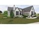 Elegant home featuring a bright white brick facade, complemented by a charming, professionally landscaped front yard at 1461 Chatham Ridge Ct, Westfield, IN 46074