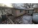 Tan house with snow covered yard, side view with shed at 3 Lake Hart, Mooresville, IN 46158