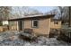 Tan block house with deck, snow on ground at 3 Lake Hart, Mooresville, IN 46158