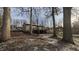 Lakefront home with deck and trees at 3 Lake Hart, Mooresville, IN 46158