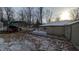 Tan house with carport and propane tank at 3 Lake Hart, Mooresville, IN 46158