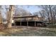 Tan house with large deck, winter scene at 3 Lake Hart, Mooresville, IN 46158