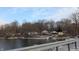 Several charming lakefront homes with snow-covered yards and beautiful lake views at 3 Lake Hart, Mooresville, IN 46158