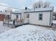 House with deck and snowy backyard at 3305 S New Jersey St, Indianapolis, IN 46227