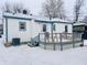 Home with deck and backyard, snow on the ground at 3305 S New Jersey St, Indianapolis, IN 46227