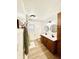 Updated bathroom with double vanity, modern fixtures, and a bathtub at 3305 S New Jersey St, Indianapolis, IN 46227