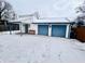 Exterior view of two-car garage with snow at 3305 S New Jersey St, Indianapolis, IN 46227