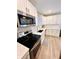 Modern kitchen featuring stainless steel appliances and white shaker cabinets at 3305 S New Jersey St, Indianapolis, IN 46227