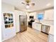 Bright and airy kitchen with stainless steel appliances and white cabinetry at 3305 S New Jersey St, Indianapolis, IN 46227