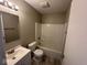Bathroom featuring a tub, toilet and vanity at 3371 Lauren Dr, Indianapolis, IN 46235