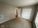 Simple bedroom with neutral walls and carpeting at 3371 Lauren Dr, Indianapolis, IN 46235