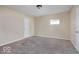 Spacious bedroom featuring neutral walls, carpet and a window at 3614 E New York St, Indianapolis, IN 46201