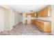 Open kitchen with wooden cabinets and ample counter space at 3614 E New York St, Indianapolis, IN 46201