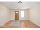 Inviting living room with warm-toned walls and a front door at 3614 E New York St, Indianapolis, IN 46201