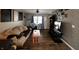 Inviting living room with comfortable seating, modern entertainment center, and decorative accent wall at 4651 Maplelawn Dr, Columbus, IN 47203