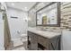 Updated bathroom with granite countertop, stylish tile, and modern vanity at 5152 Coppertree Ln, Avon, IN 46123