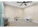 Bright bedroom with ceiling fan, storage, and carpeted floors at 5152 Coppertree Ln, Avon, IN 46123