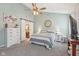 Main bedroom with sliding barn door to en-suite bathroom at 5152 Coppertree Ln, Avon, IN 46123