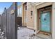 Tan exterior condo with private patio, and snow covered ground at 5152 Coppertree Ln, Avon, IN 46123
