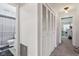 Hallway with linen closet and view into bedroom with carpet flooring at 5152 Coppertree Ln, Avon, IN 46123