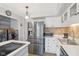 Modern kitchen with stainless steel appliances and white cabinets at 5152 Coppertree Ln, Avon, IN 46123