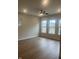 Bright, airy bedroom with hardwood floors, a ceiling fan, recessed lighting, and multiple windows at 525 Gilder Dr, Carmel, IN 46032