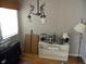 Dining room with hardwood floors and a unique light fixture at 5420 Skyridge Dr, Indianapolis, IN 46250