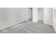 Bright bedroom with gray carpet, closet, and window at 5751 Cr W 750 N, McCordsville, IN 46055