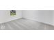 Well-lit bedroom featuring gray carpeting and a window view at 5751 Cr W 750 N, McCordsville, IN 46055