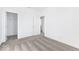 Spacious bedroom with gray carpeting and access to a bathroom and closet at 5751 Cr W 750 N, McCordsville, IN 46055