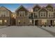 Modern home exterior with gray siding and snow covered lawn at 5751 Cr W 750 N, McCordsville, IN 46055